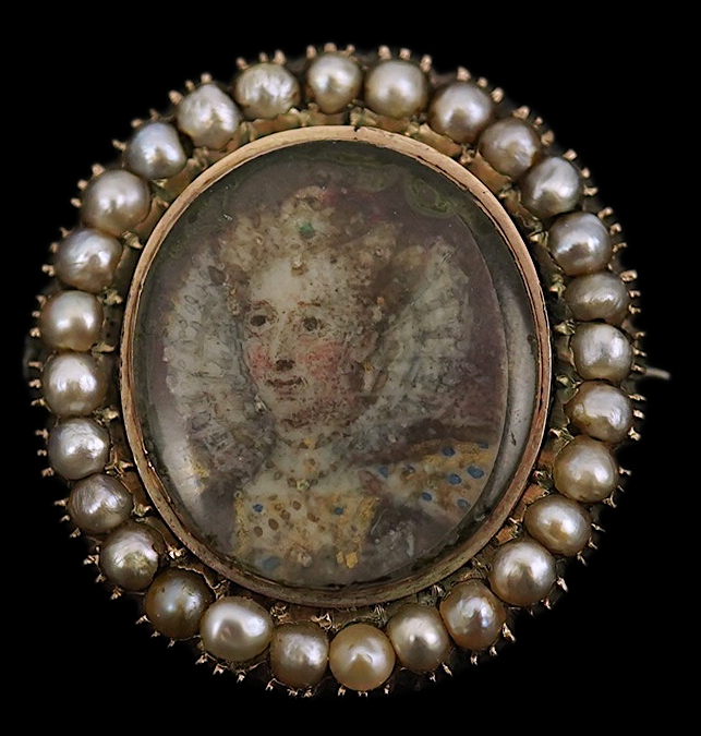 An early 19th century yellow metal and split pearl mounted oval miniature portrait pendant brooch